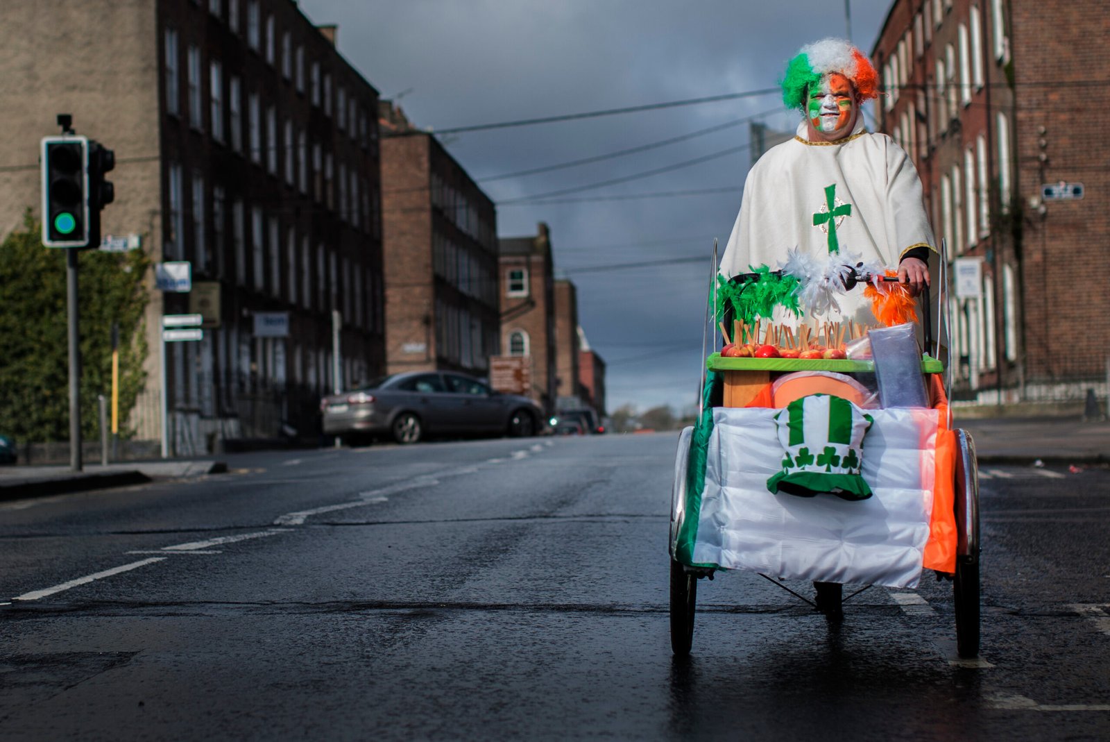 LIMERICK, IRELAND, MARCH, 17, 2013: People along the Limerick street, prepares to participate during the Annual St Patrick's Day parade on March 17, 2013 in Limerick, Ireland.